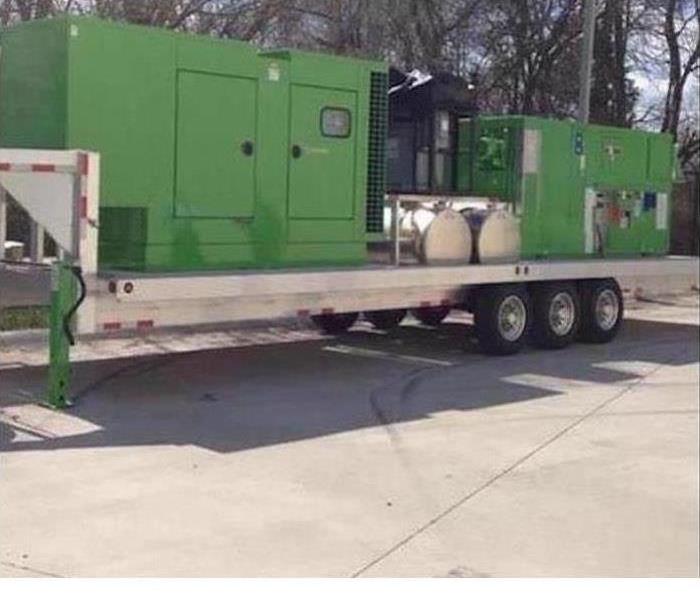 generators and dehus on semi-bed servpro green