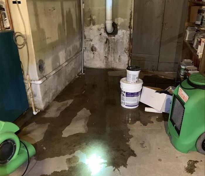 Basement with water spillage needing drying