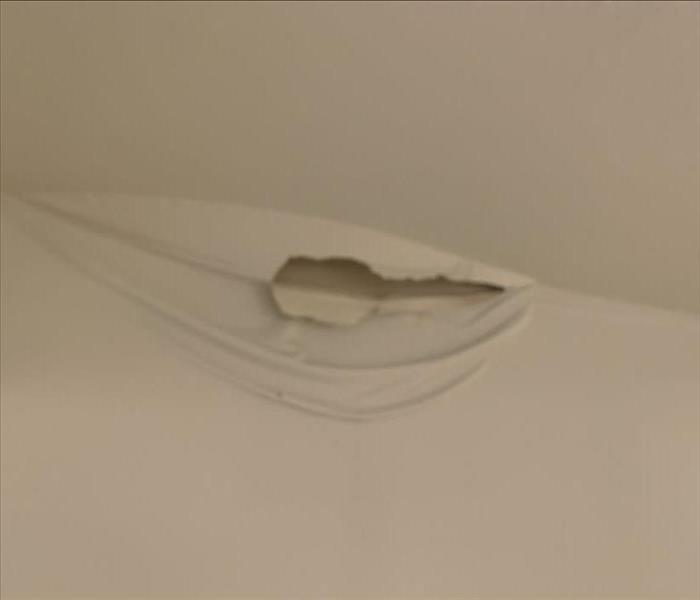 WATER BLISTER IN CEILING AND WALL